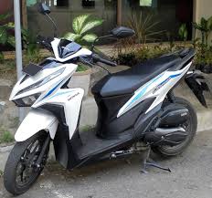 Black Yamaha NMAX scooter side view
